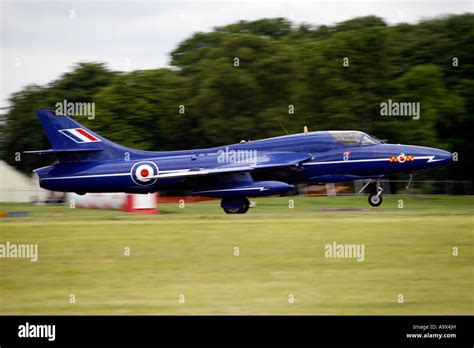 Hawker Hunter in Livery of Blue Diamonds Display Team taking off Stock Photo - Alamy