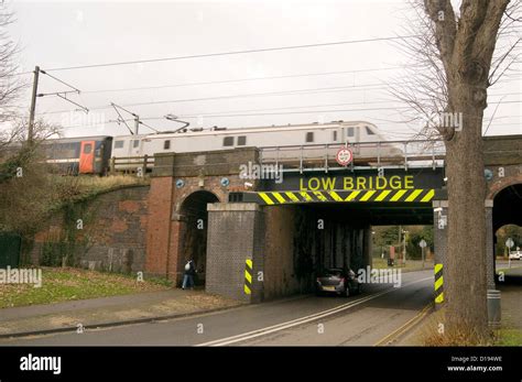 low bridge bridges sign signs road rail height restriction uk Stock Photo - Alamy