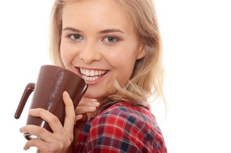 Premium Photo | Woman with coffee cup against white background