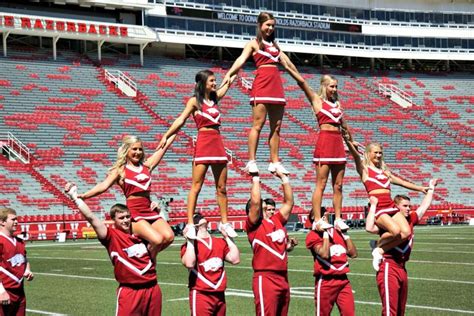 Behind Game Day: Razorback Spirit Squad | Cheerleading, College cheerleading, Arkansas razorbacks