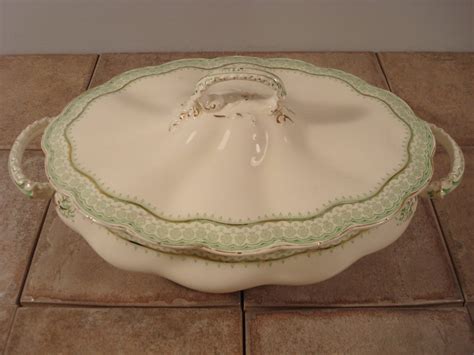 Beautiful old white serving dish with lid side handles and