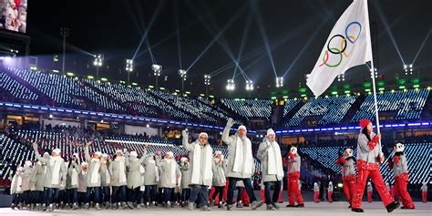 Russian Olympic team walks out in neutral colors at opening ceremony ...