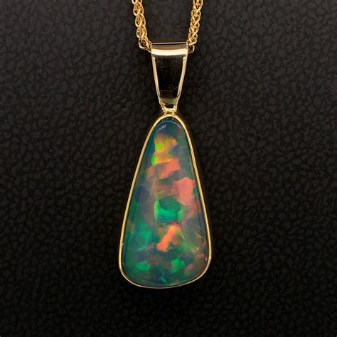 Ethiopian Opal Pendant | Ethiopian opal pendant, Opal pendants, Pendant