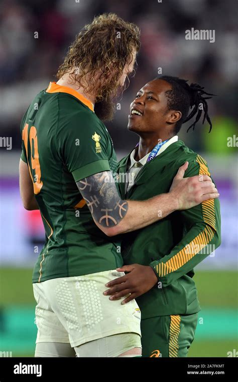 South Africa's RG Snyman (left) with Sbu Nkosi after the 2019 Rugby World Cup final match at ...