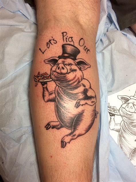 Just got another tattoo pig in a tophat with bacon