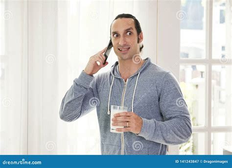 Man Cringing Face when Calling on Phone Stock Image - Image of cringing, calling: 141243847