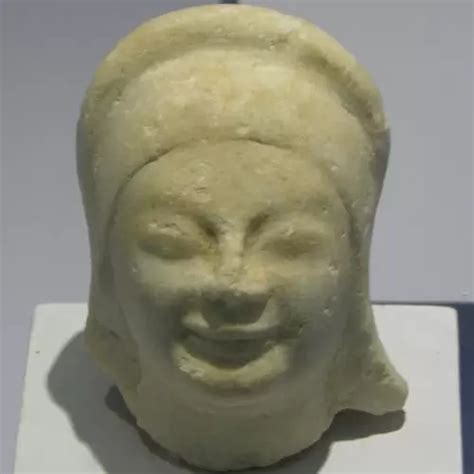 Miletus sculpture | a 550BC female head with an Archaic Smile