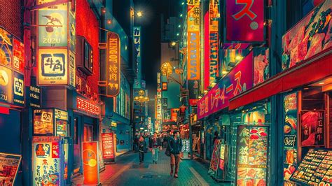 a city street filled with lots of neon signs