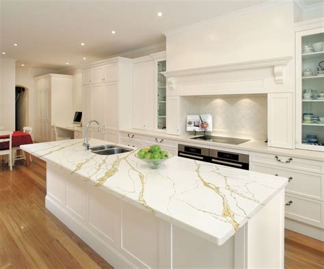 calacatta gold countertop - White kitchen countertops with golden vein - #bathroomde… | Quartz ...