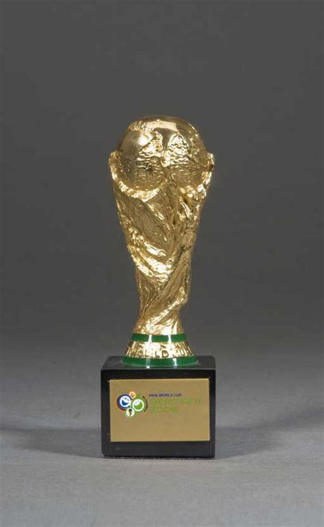 471: A miniature replica of the FIFA World Cup trophy,