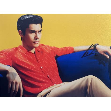 Henry Golding signed photo | EstateSales.org