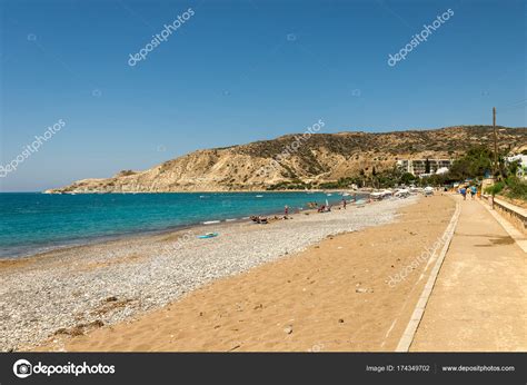 Pissouri, Cyprus, July 2017: Pissouri Bay beach with tourists relaxing ...