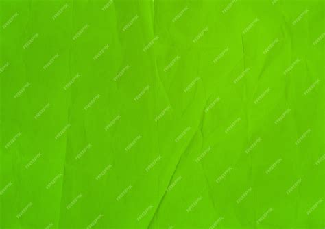 Premium Photo | Green crumpled paper texture background