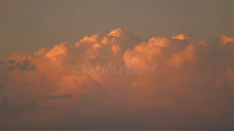 Beautiful Sky Above the Ocean with Pink Clouds. Large Cumulus Clouds Swirl Rapidly in the Sky ...