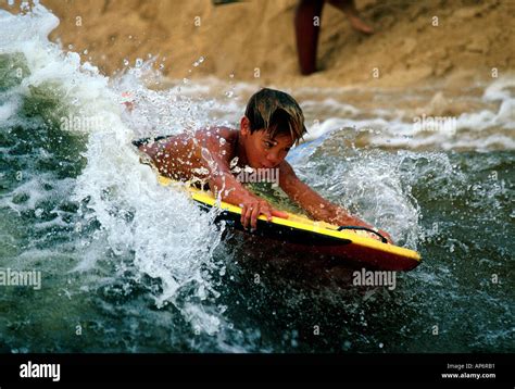 BOOGIE BOARDING ACTION Stock Photo - Alamy