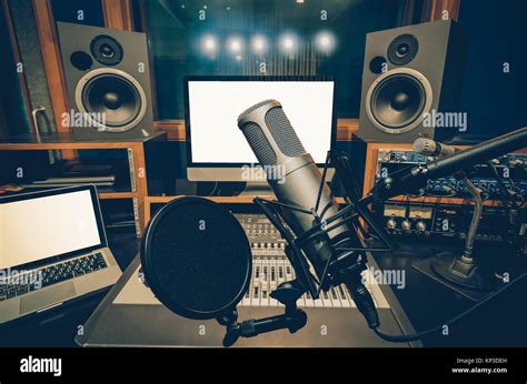 Professional condenser studio microphone over the music studio ...