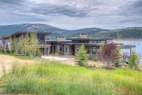 This mountain modern lakeside home designed by Stillwater Architecture ...