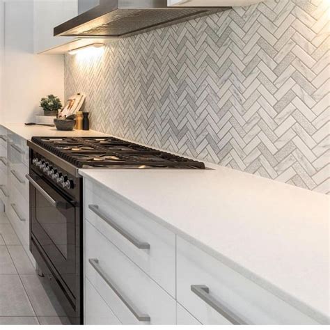 Amber Tiles on Instagram: “Herringbone splashback at its finest! Thanks ...