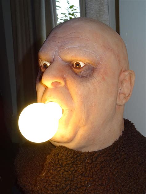 Uncle Fester From THE ADDAMS FAMILY Gets a Life-Size Lamp with a Lightbulb in His Mouth — GeekTyrant