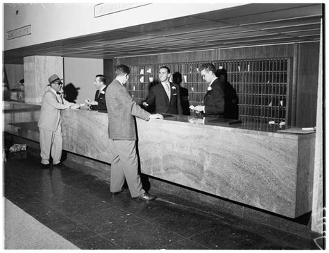 The Beverly Hilton - Beverly Hills, CA. The front desk on opening day, 1955. via Maria Mancini f ...