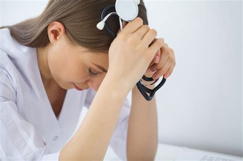 Premium Photo | Doctor. sad or crying female nurse at hospital office