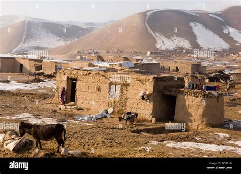 Traditional Afghan village in the mountains near Turkmenistan border in Faryab Province ...