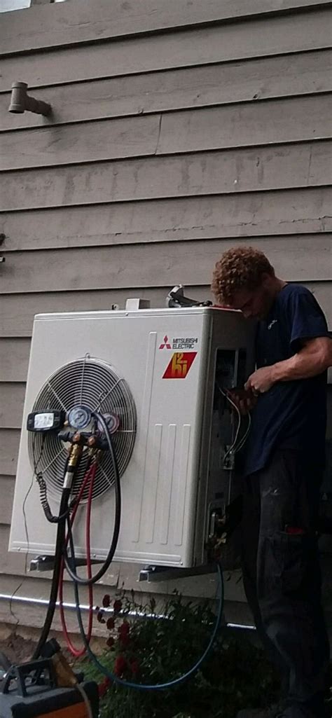 Compass Installation Technician, Kyle, installing a Mitsubishi Hyper Heat H2i single zone heat ...