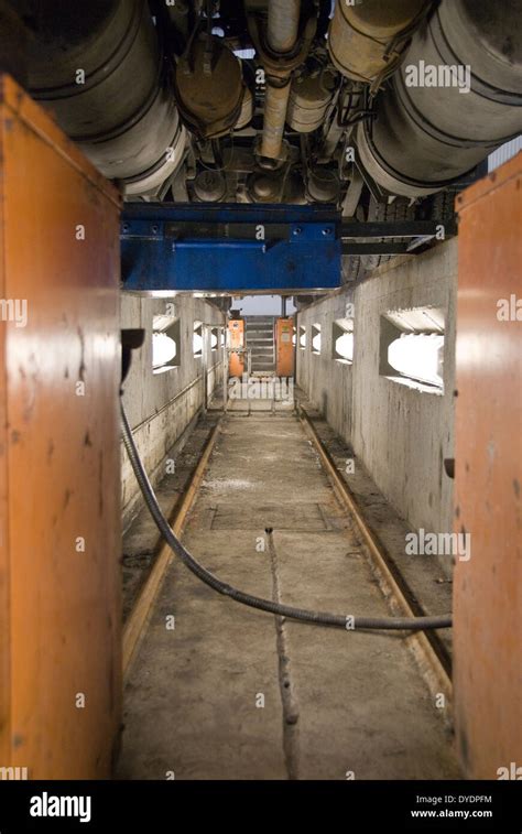 Duty oil change pit in a garage, under a commercial truck Stock Photo ...