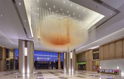 Office Building Lobby Lighting | Office building lobby, Lighting design interior, Hotel chandelier