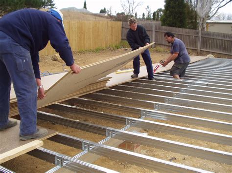 Floor Sheet being installed over a Boxspan steel floor frame. | Steel frame house, Steel ...