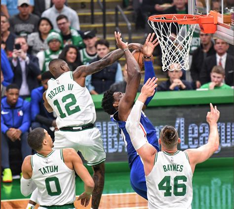 Celtics wear down 76ers, win 105-87 on Opening Night