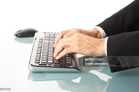 Hands Typing On Keyboard High-Res Stock Photo - Getty Images