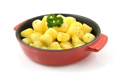 Red Pan with Fresh Baked Potatoes Stock Photo - Image of parsley, dinner: 10108138