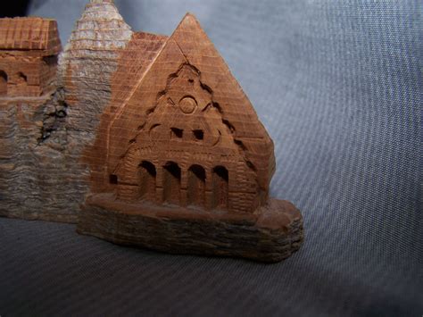 Little village carved out of wood. | Antiques Board