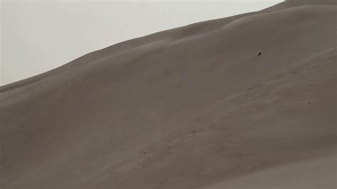 Snowboarding at Great Sand Dunes National Park during a Thunderstorm ...