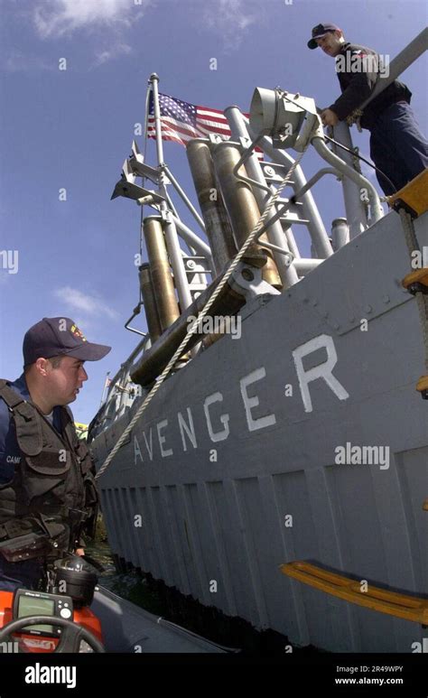 US Navy Mineman Seaman prepares to get a Rigid-Hull Inflatable Boat (RHIB) underway Stock Photo ...