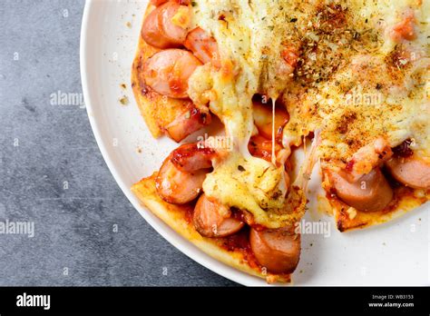 sausage cheese pizza Stock Photo - Alamy