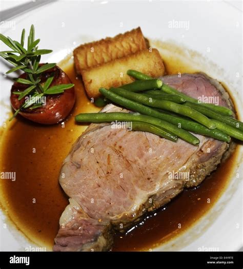 Beef Roast With Vegetables Stock Photo - Alamy