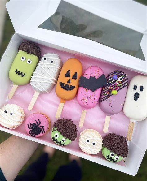 a box filled with halloween treats on top of a table