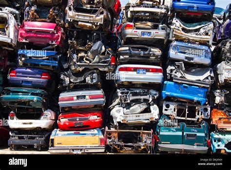 A Pile of Stacked Junk Cars - Discarded Junk Cars Piled Up After Stock Photo: 63725693 - Alamy