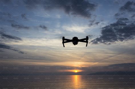 Silhouette Of A Drone In Sunset - Stock Photos | Motion Array