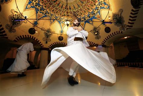 Traditional Turkish Sufi Whirling Dervish spiritual dance. Goreme ...