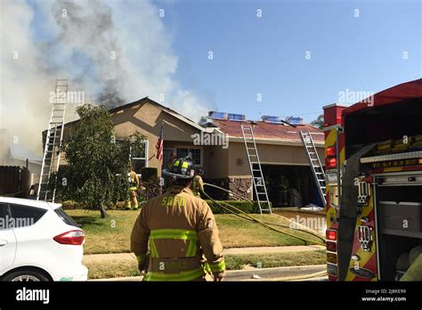 A house fire in the Kearny Mesa neighborhood of San DIego resulted in a first alarm assignment ...