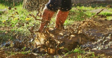 Girl barefoot in mud Stock Video Footage - 4K and HD Video Clips ...