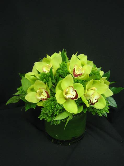 Green cymbidium orchid centerpiecevendors Starbright Floral Design ...