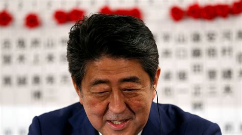 Japan's Shinzo Abe vows to 'deal firmly' with North Korea