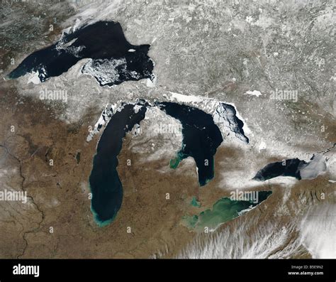 Satellite view of the Great Lakes region USA, early Spring, with Winter snows retreating Stock ...