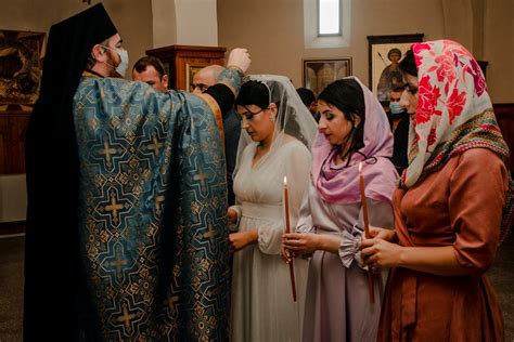 People Praying in Church with a Priest in Front of them · Free Stock Photo