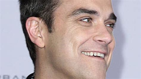 Robbie Williams - Biography | HELLO!