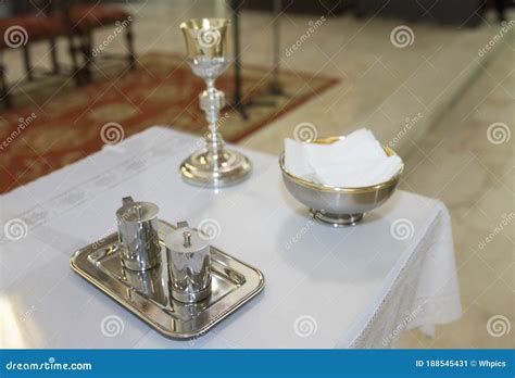 Chalice, Communion Wafers, Wine and Water Jugs Stock Image - Image of ...